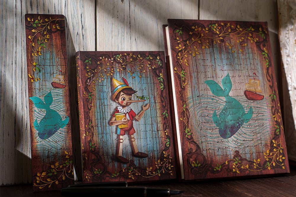 Agenda 2027 PAPERBLANKS Carlo Collodi, Pinocchio - 1 semaine sur 2 pages - Mini - Softcover - Horizontal - 176p - 9780349721170